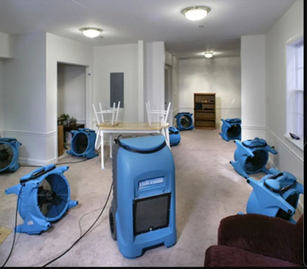 Air movers and dehumidifier setup for Water Damage Restoration in North Valley